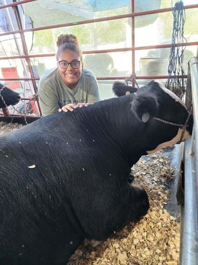 student with an animal 