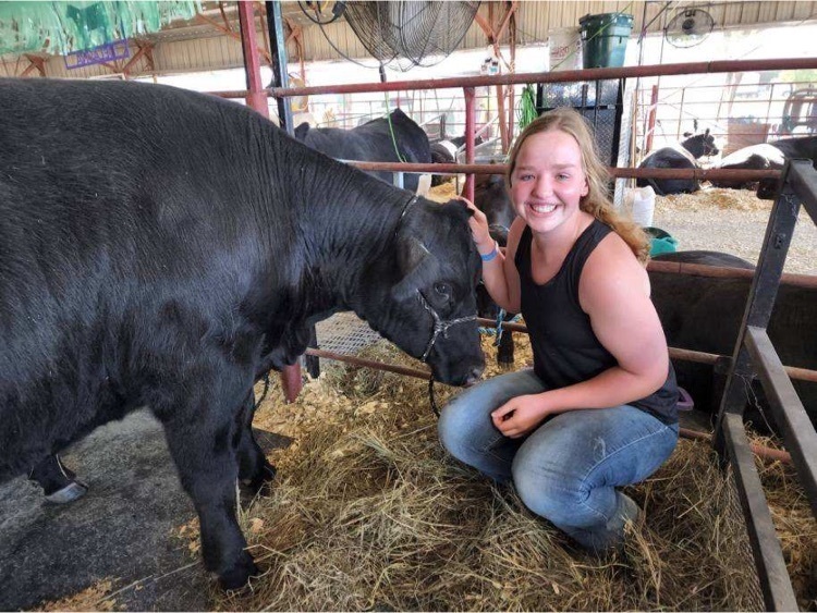 student with an animal 