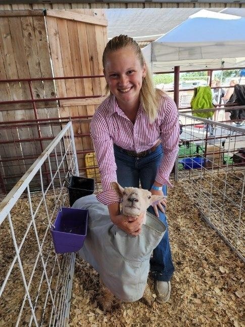 student with an animal 