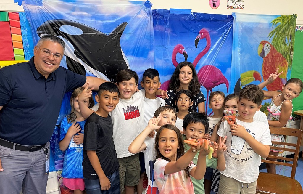 ELL campers pose for a picture with Superintendent Dr Raymond Gonzalez 