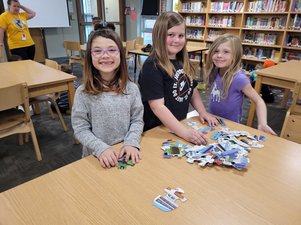 students doing a puzzle