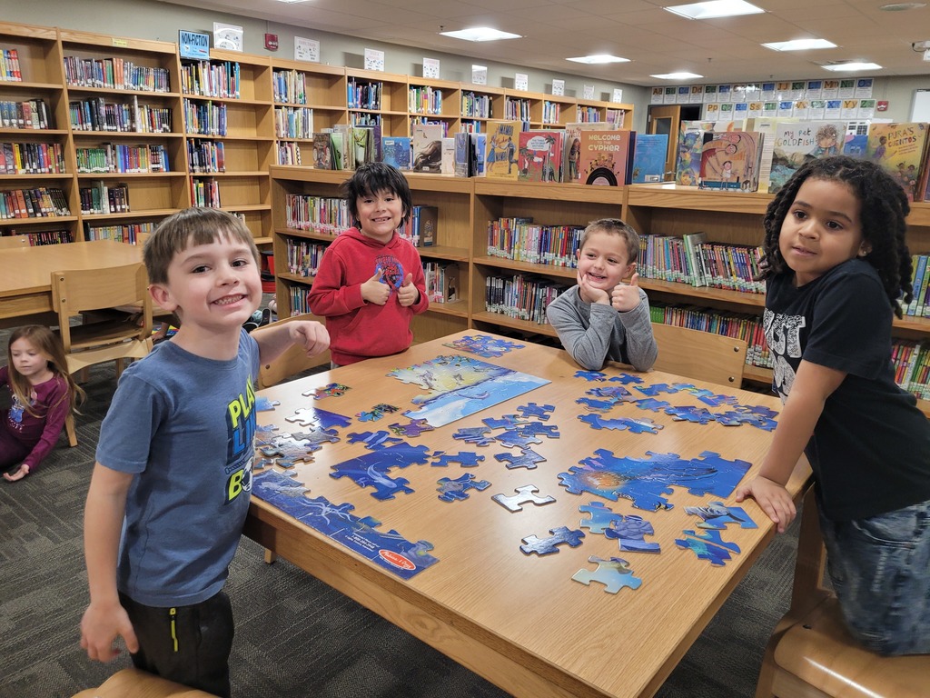 students doing a puzzle