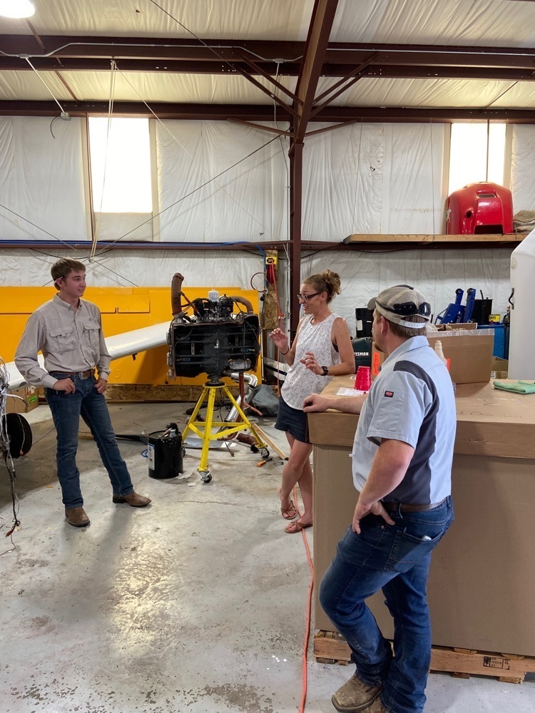 Curtis and Kymberly Logan took time out of their day to explain their apprenticeship idea to senior Orinn Norris