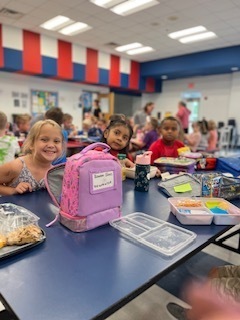 Kindergartners Enjoying Lunch