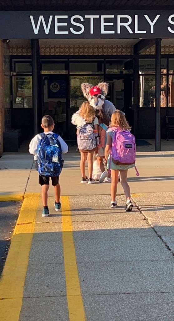 Weston Wolf welcomes students to school