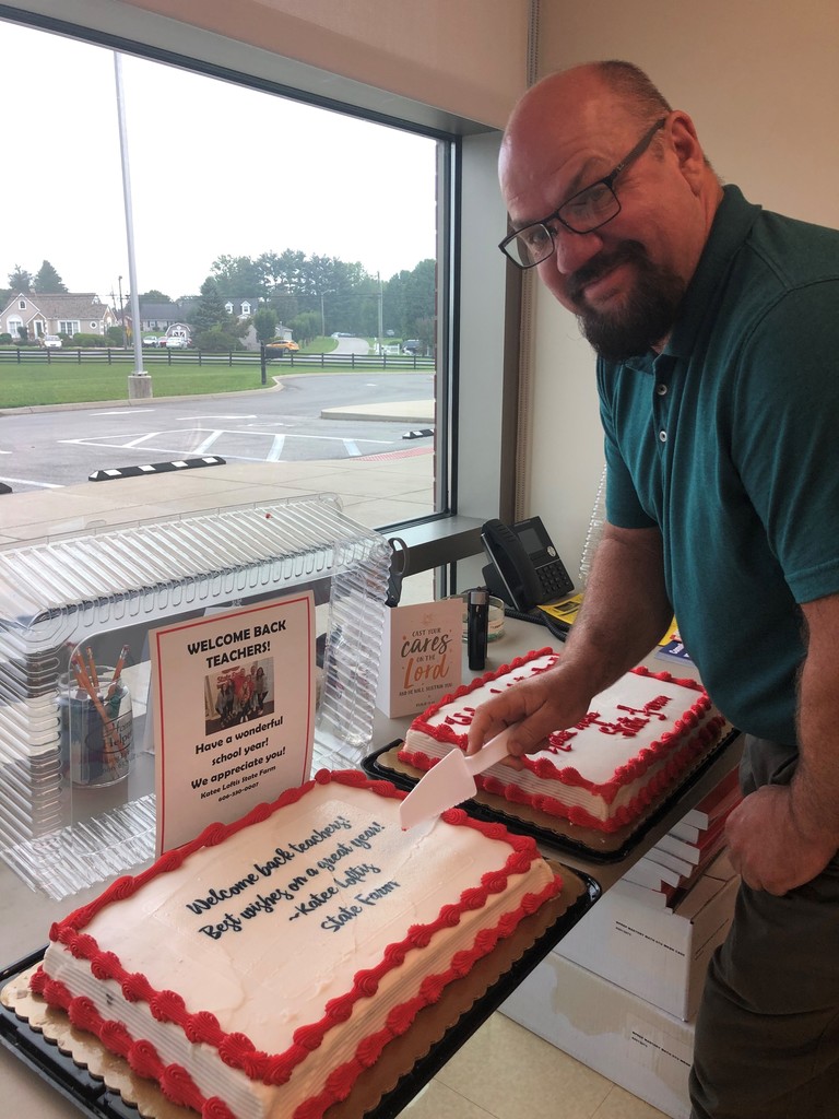 Dr. Davis serving cake