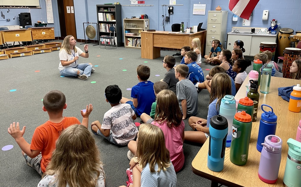 Third-graders in Ms. Holinek's class enjoy music with Ms. Turnbull