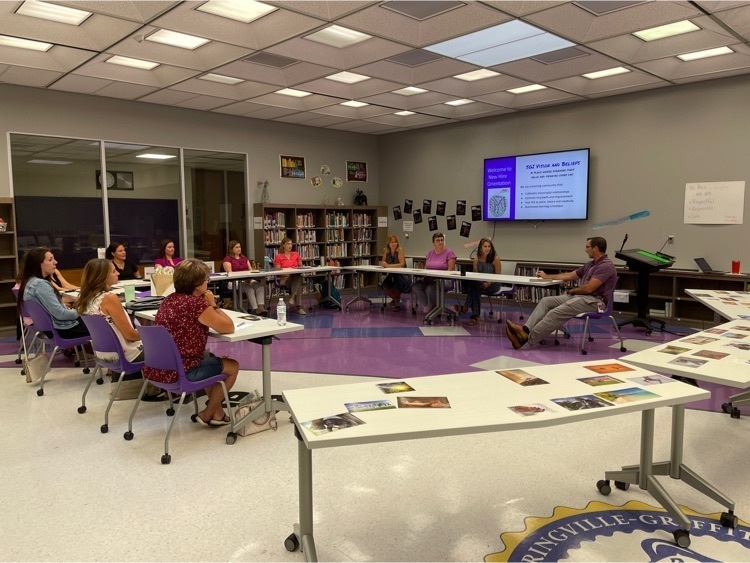 New teachers sit in the SMS LMC for orientation