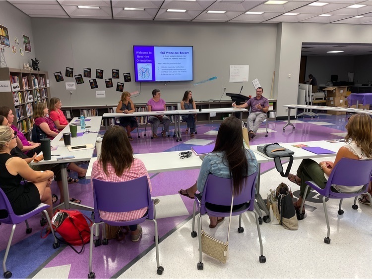 New teachers sit in the SMS LMC for orientation
