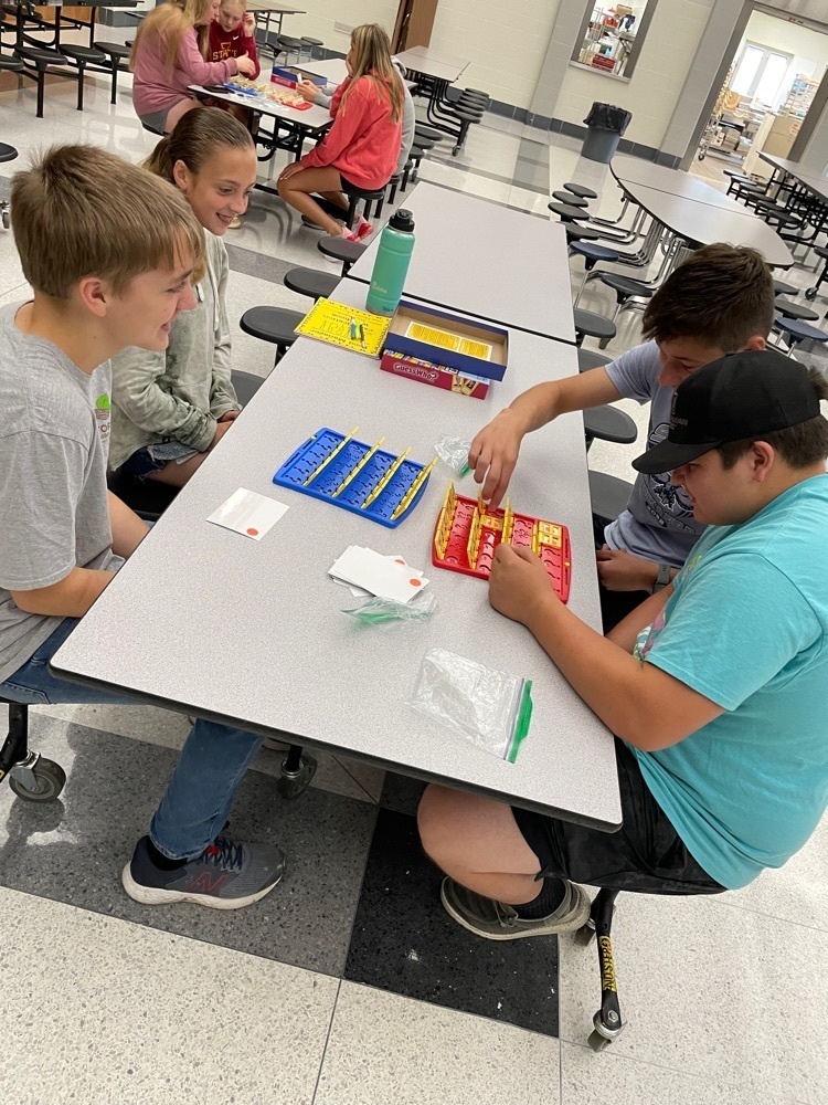 students playing Guess Who