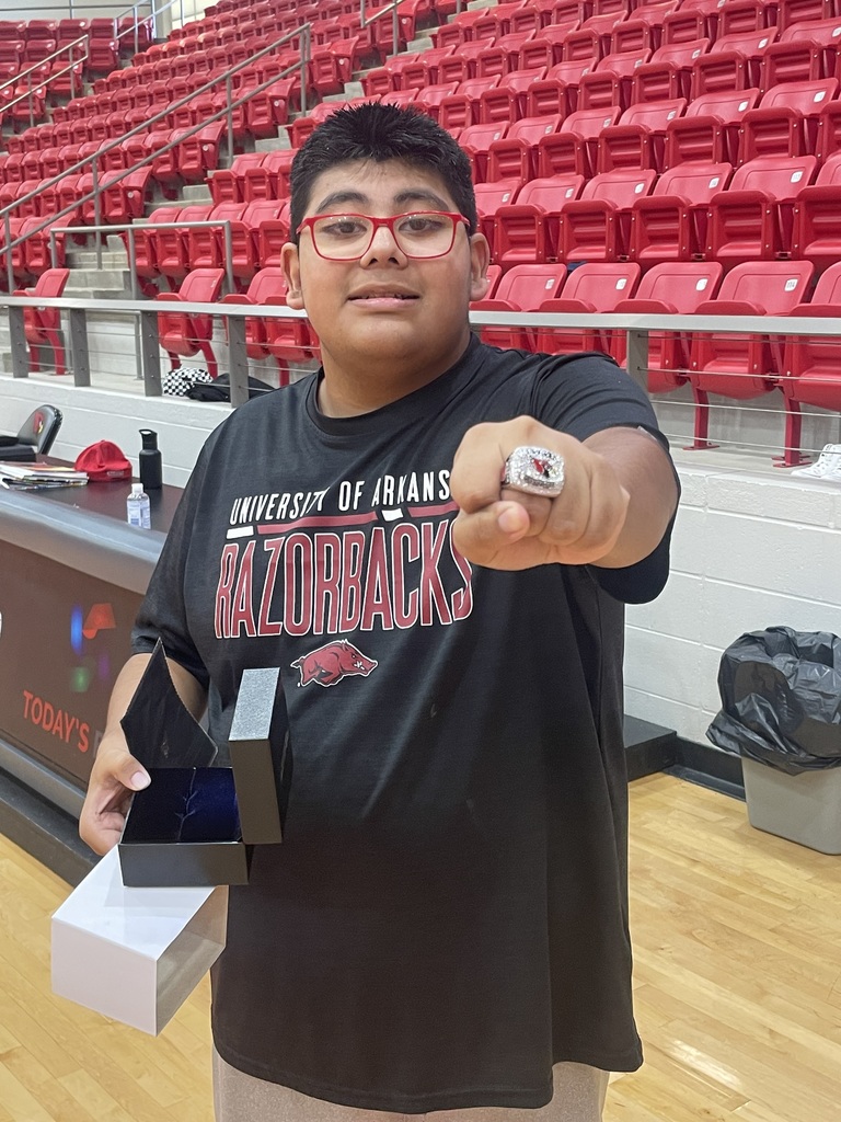 victor showcasing his ring for the camera