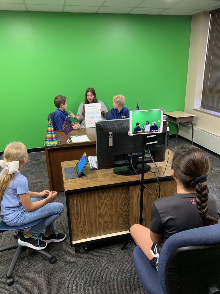 Newscast crew with Miss Louie