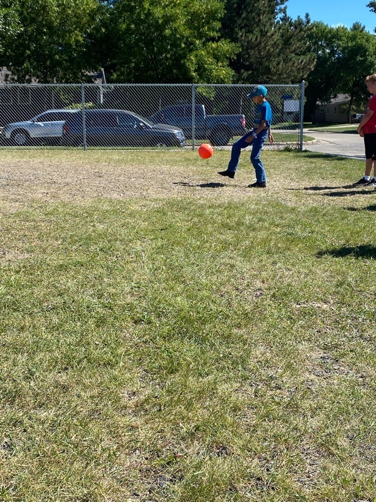 student kicking 