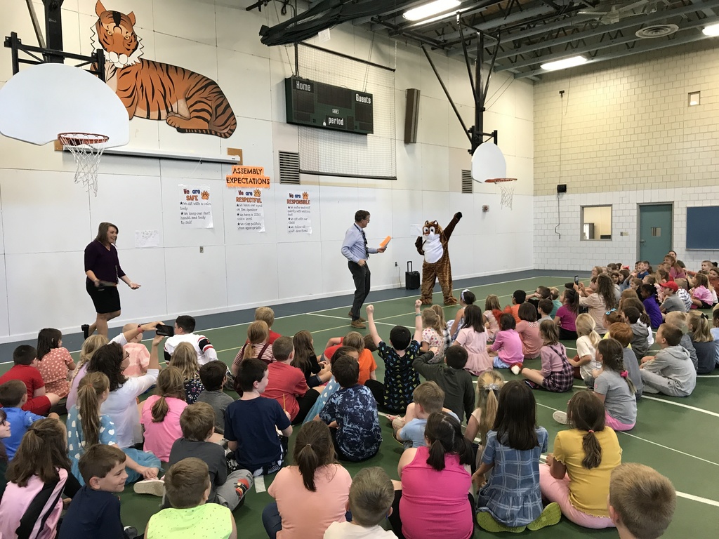 school assembly with Tiger mascot