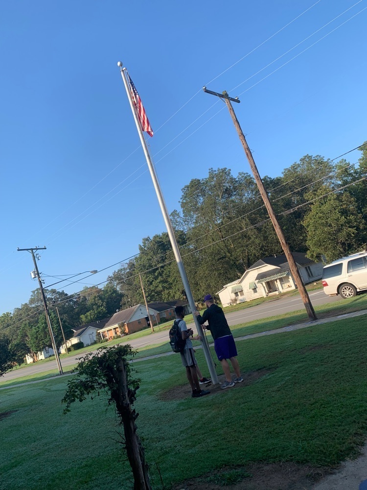 putting up the flag 