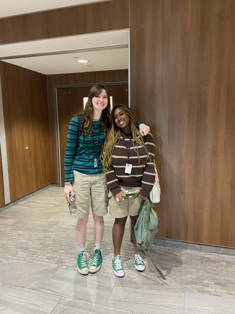 Twin Tuesday; pair of students wearing matching striped sweaters