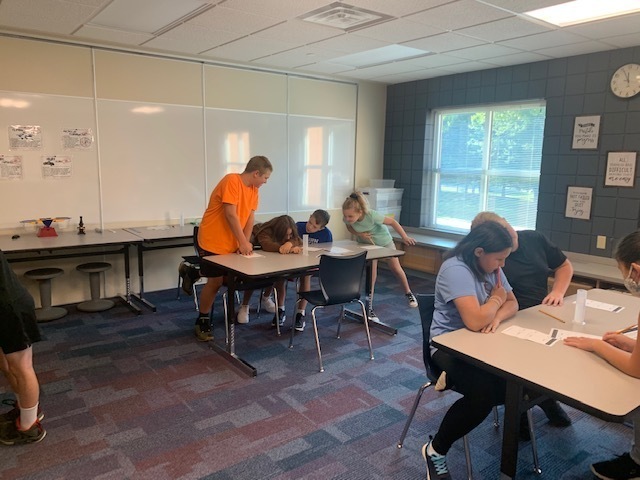 students sitting at a table