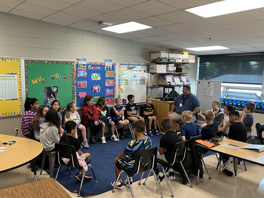 Students having a morning meeting