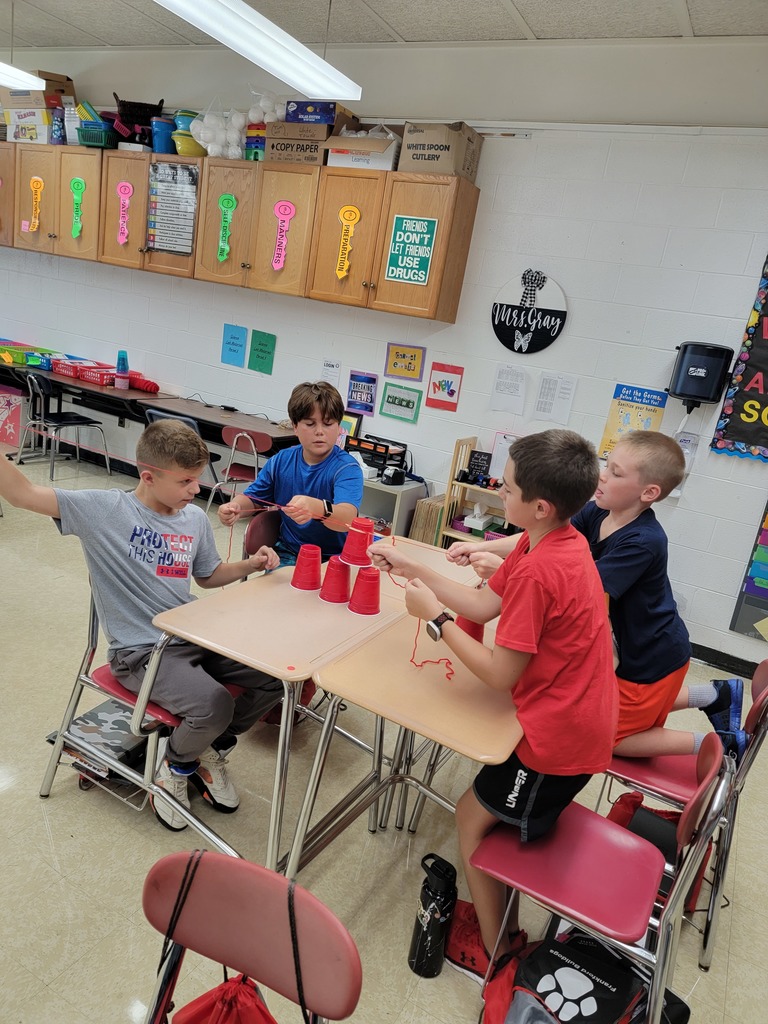 Working as a team towards a common goal. 