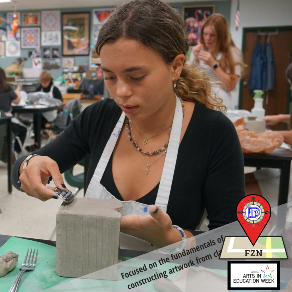 Ceramics Class: Student adds texture to clay box