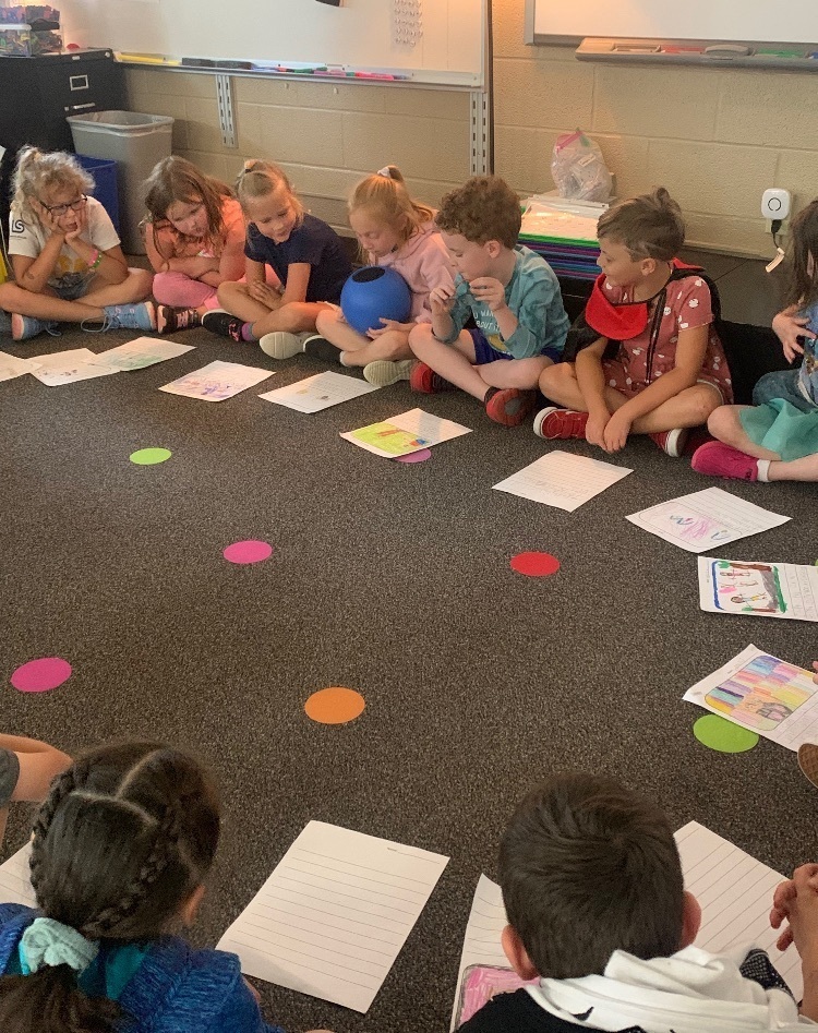 students sharing in a circle