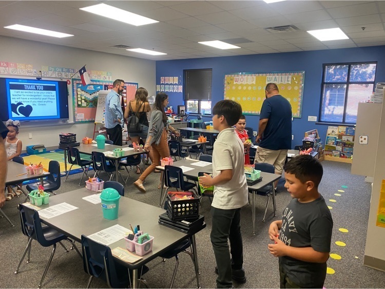 students and parents at open house