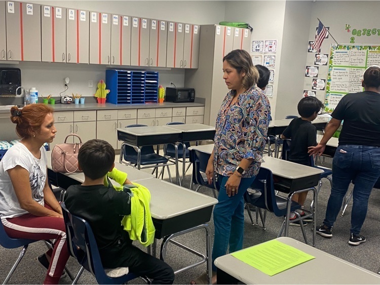 students and parents at open house