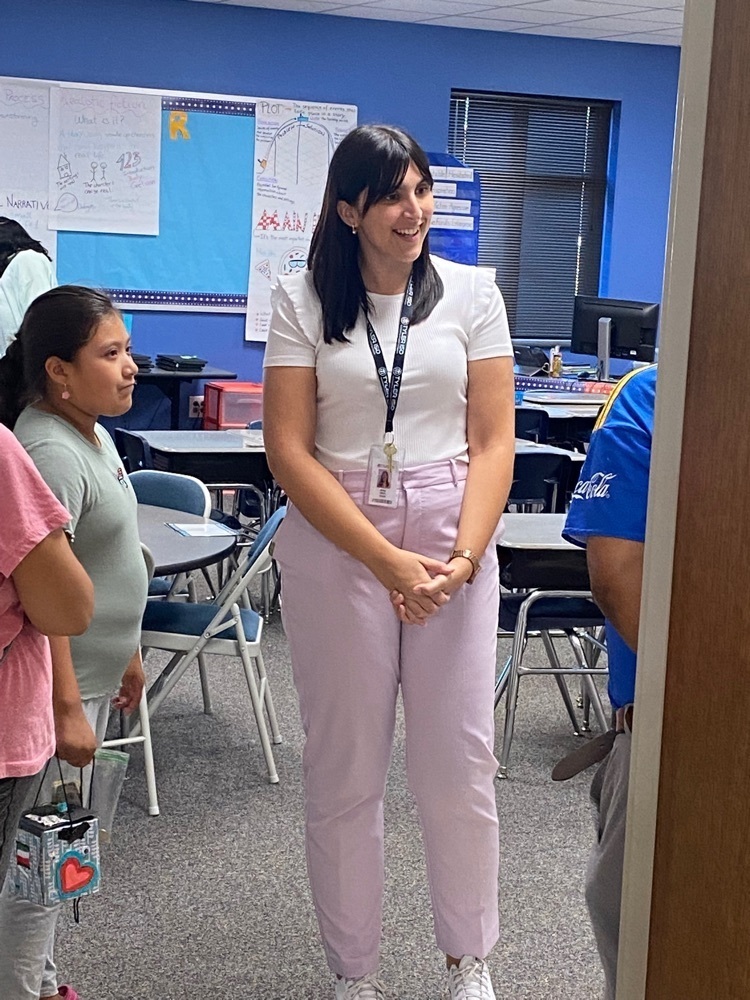 teacher taking to parents