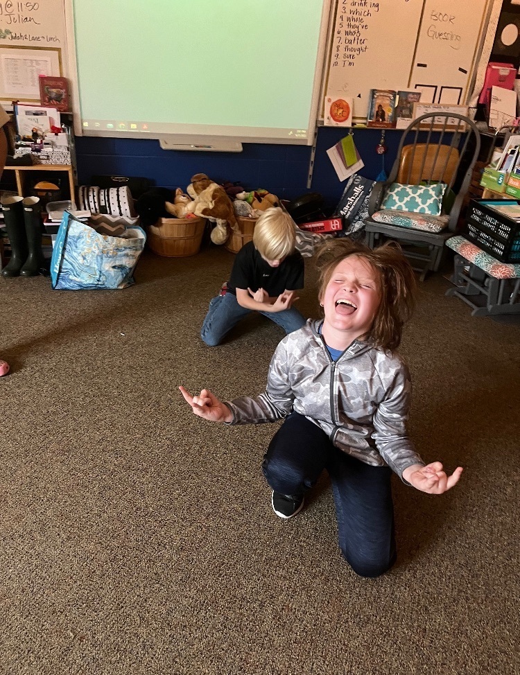 5th graders acting out vocabulary words.