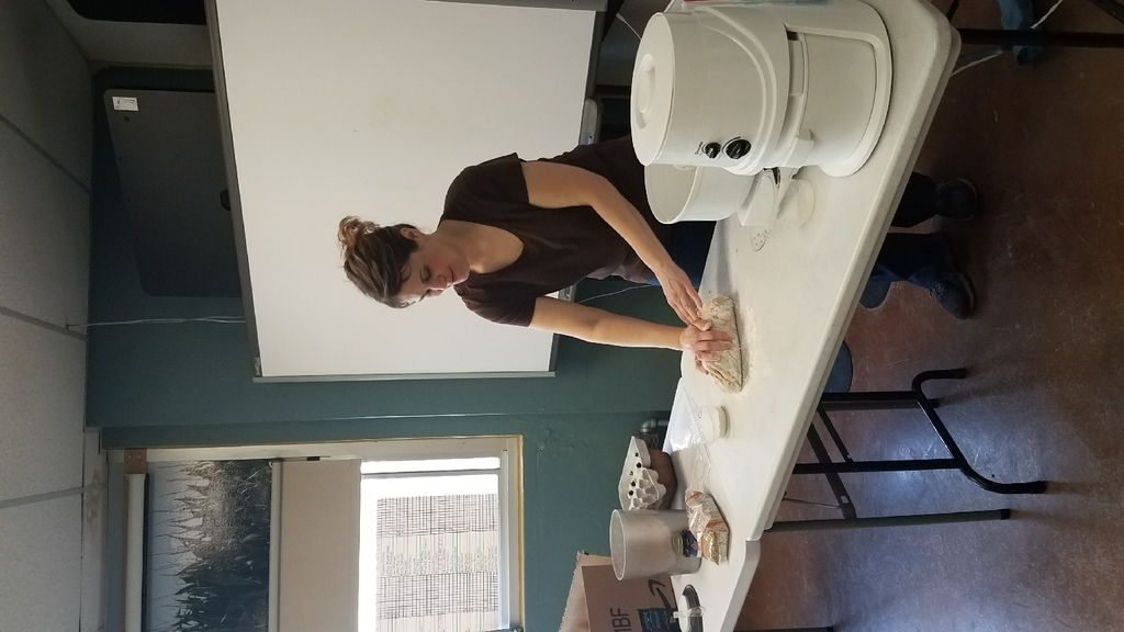 Traci Sechler explaining why kneading bread is important.