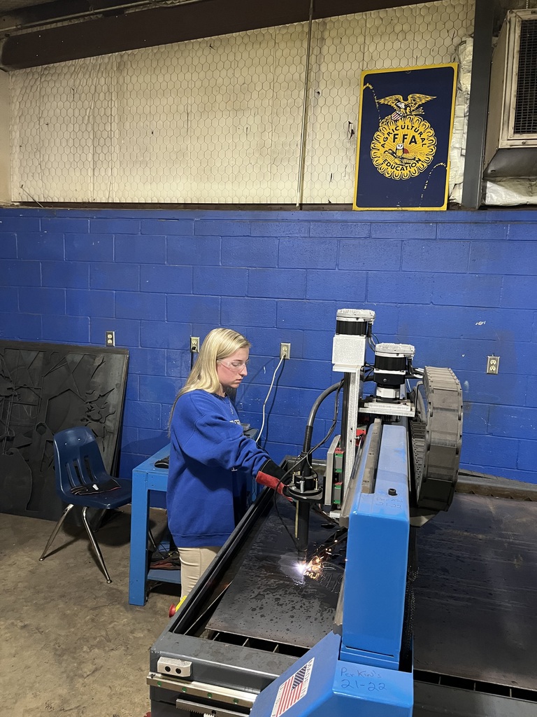Student At CNC Machine