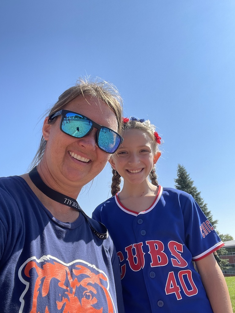 Staff and student wearing sports attire