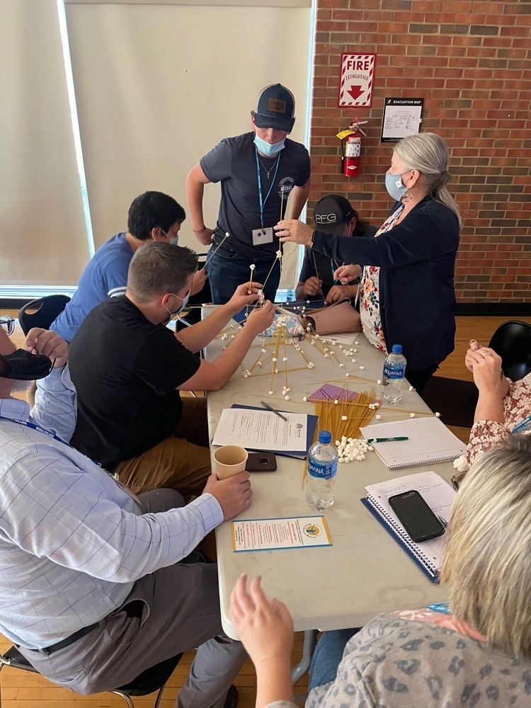 All hands on deck for this sticky activity! Chaperone Sharron Adams is assisted by Michael Mason and Jacob Ratliff