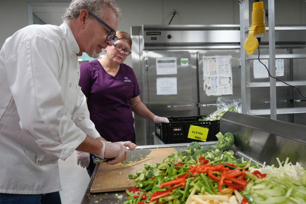 Chef Getzin and the Fayetteville High School Child Nutrition staff are hard at work today preparing meals for students and staff! Chef Getzin is here working with the Child Nutrition Department, thanks to a generous grant funded and supported by the Lifetime Foundation. Today is an Asian-themed lunch: Sweet and Sour Chicken Spicy Orange Chicken Fried or Steamed Rice Stir-Fry Fresh Vegetables & Egg Rolls Many thanks to Chef Getzin and the Lifetime Foundation for this great opportunity!