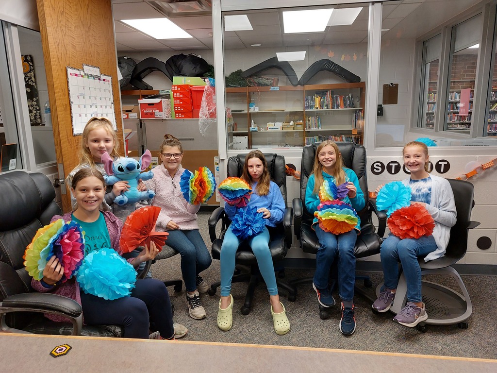 students decorating for book fair