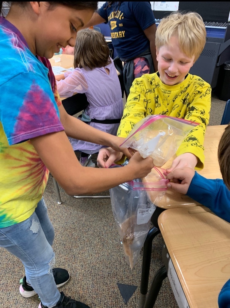 students doing a science experiment