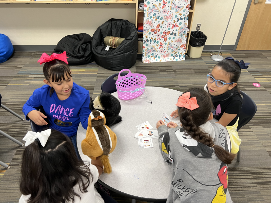 students problem solving with puppets