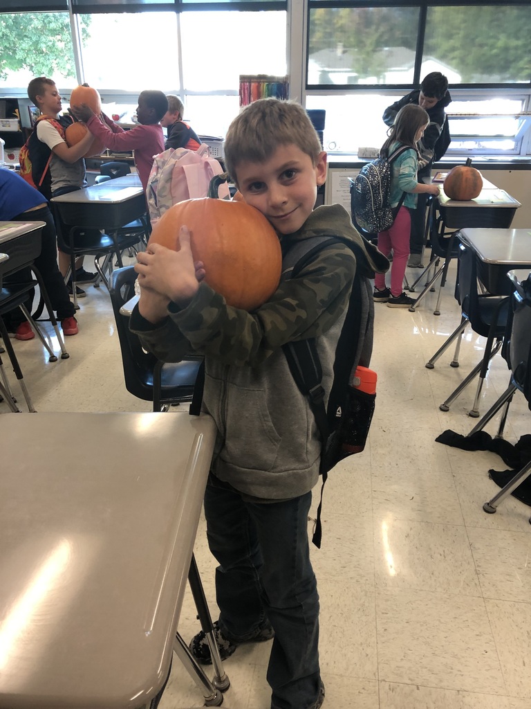 Student with pumpkin