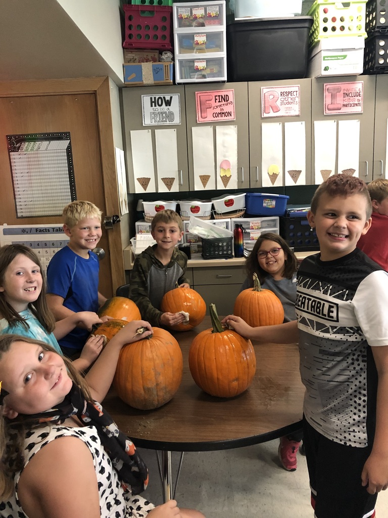 Students with pumpkins
