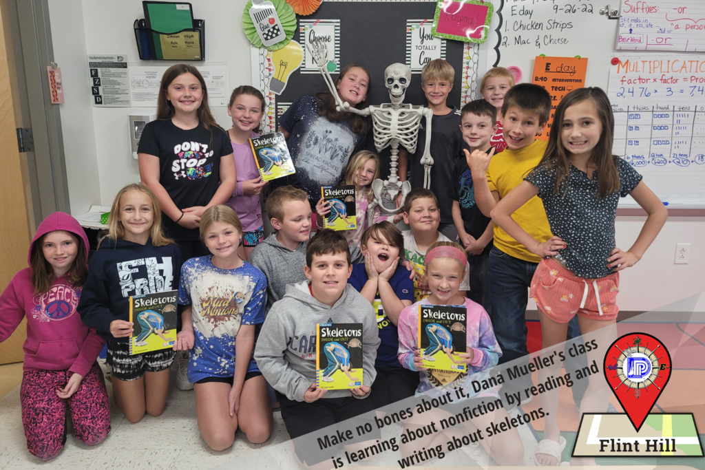 Make no bones about it, Dana Mueller's class, posing with a skeleton,  is learning about nonfiction by reading and writing about skeletons.