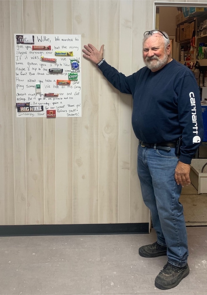 Custodian, Willie Wilson, with his candy sign!