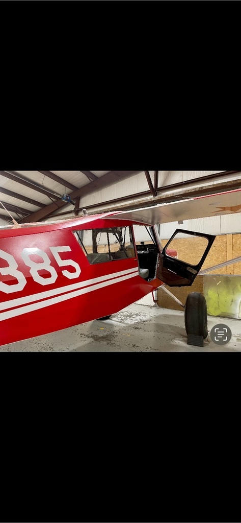 finishing touches on a Bellanca Citabria