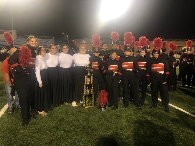 band members winning trophy