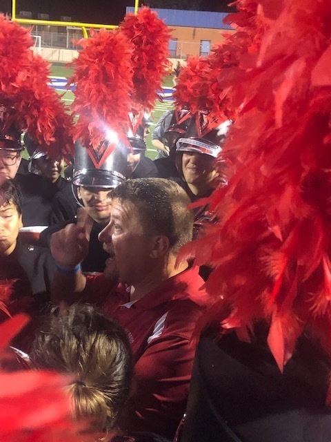 band director with band members