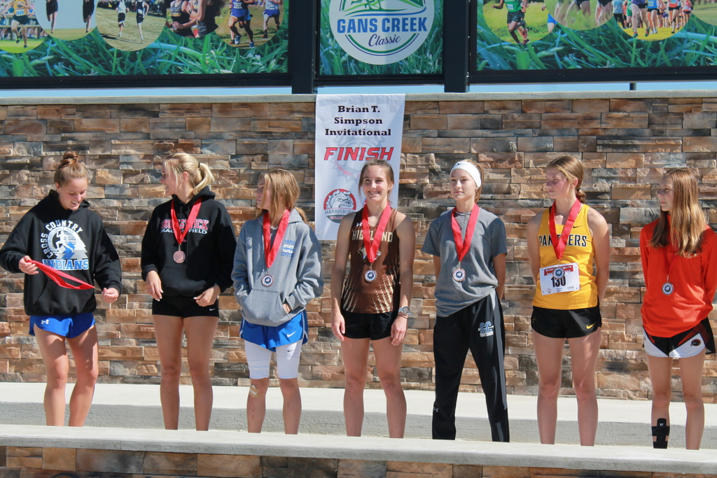Kaycie Stahl (middle) at the Brian T. Simpson awards ceremony after receiving her medal 