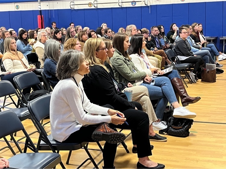 Elementary teachers listening to the presentation. 