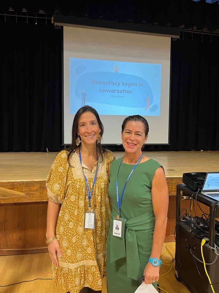 Two supervisors getting ready to present.