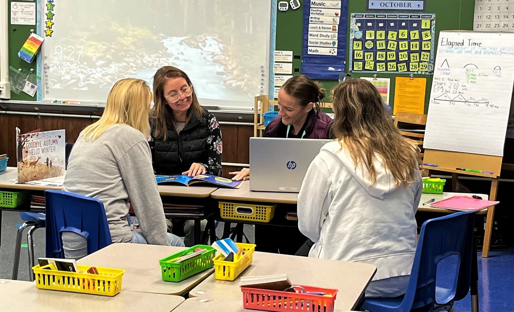 Four teachers work together during professional development session