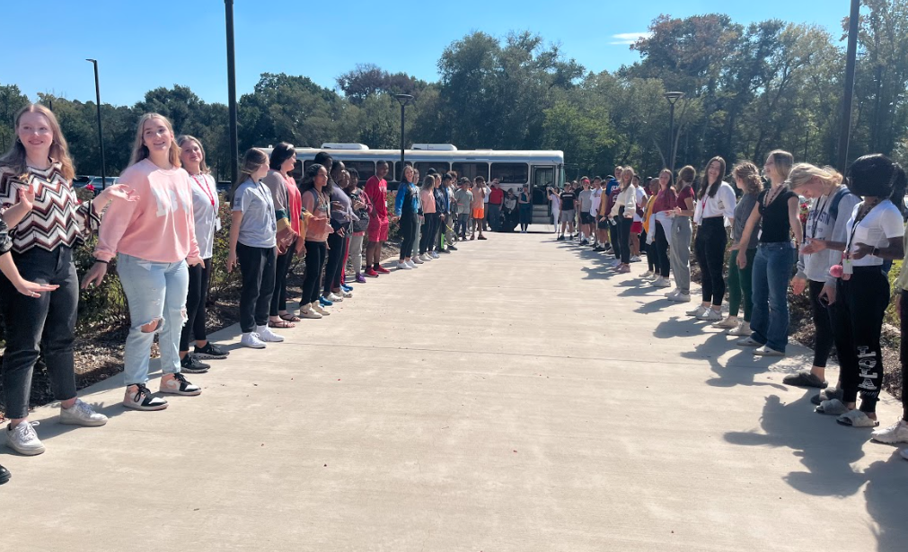 Southern Belles Drill Team and Varsity cheer sending off Legacy tennis team!