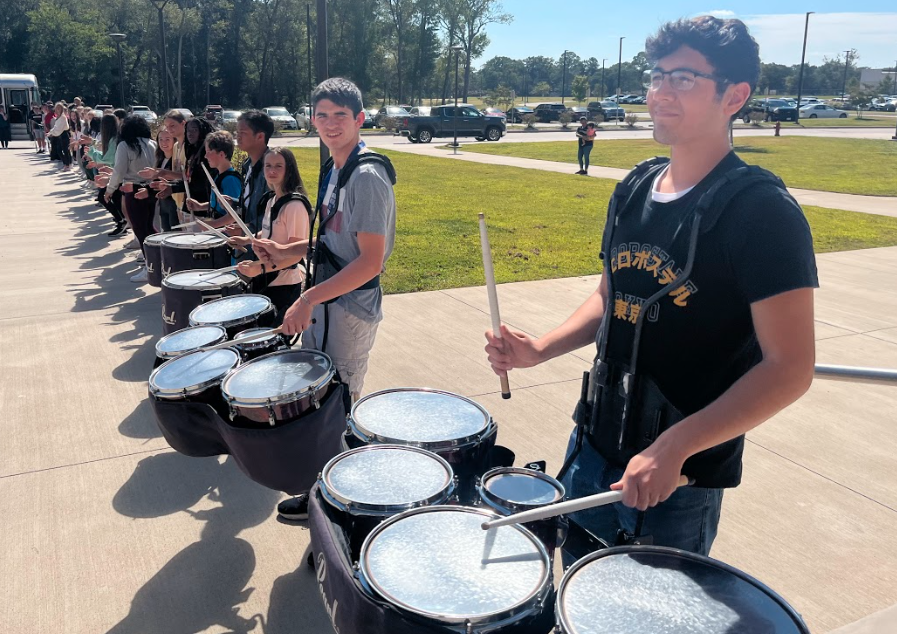 Legacy drumline providing music for our Tennis send off